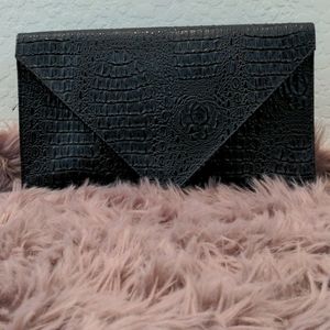 Large black strapless clutch